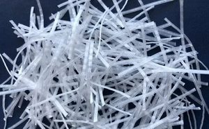 Polymer fibres for concrete and screeding